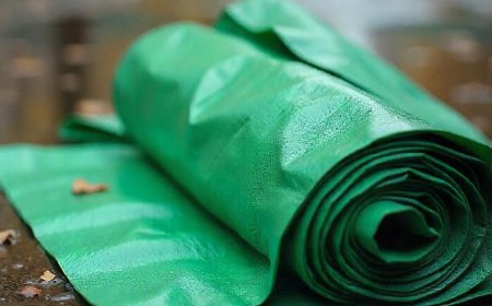 How Custom Made Mesh Tarps from Tarps Plus Improve Safety on Construction Sites